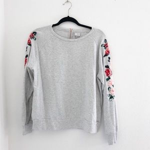 Sweatshirt with floral embroidery on sleeve